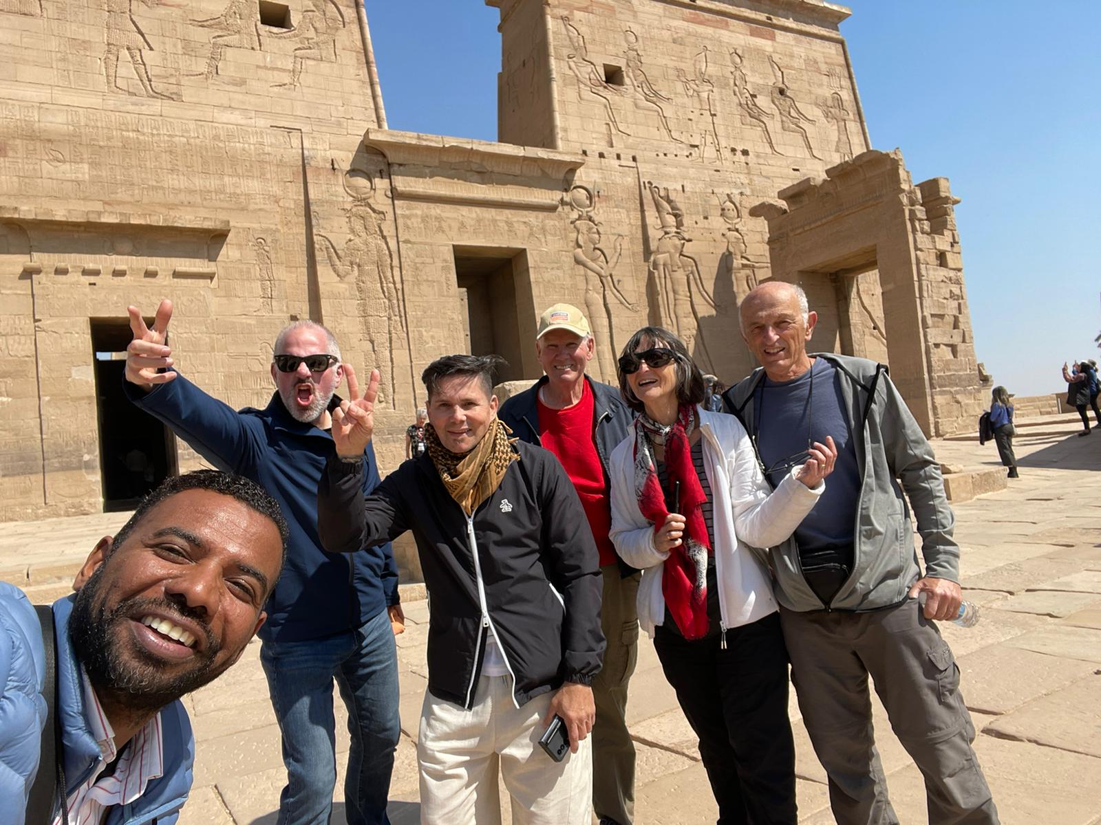 Egypt Story Tours guide with guests during a private temple visit in Egypt
