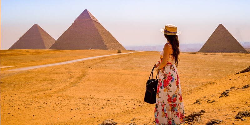 Traveller looking across the Pyramids of Giza on a private Cairo day tour