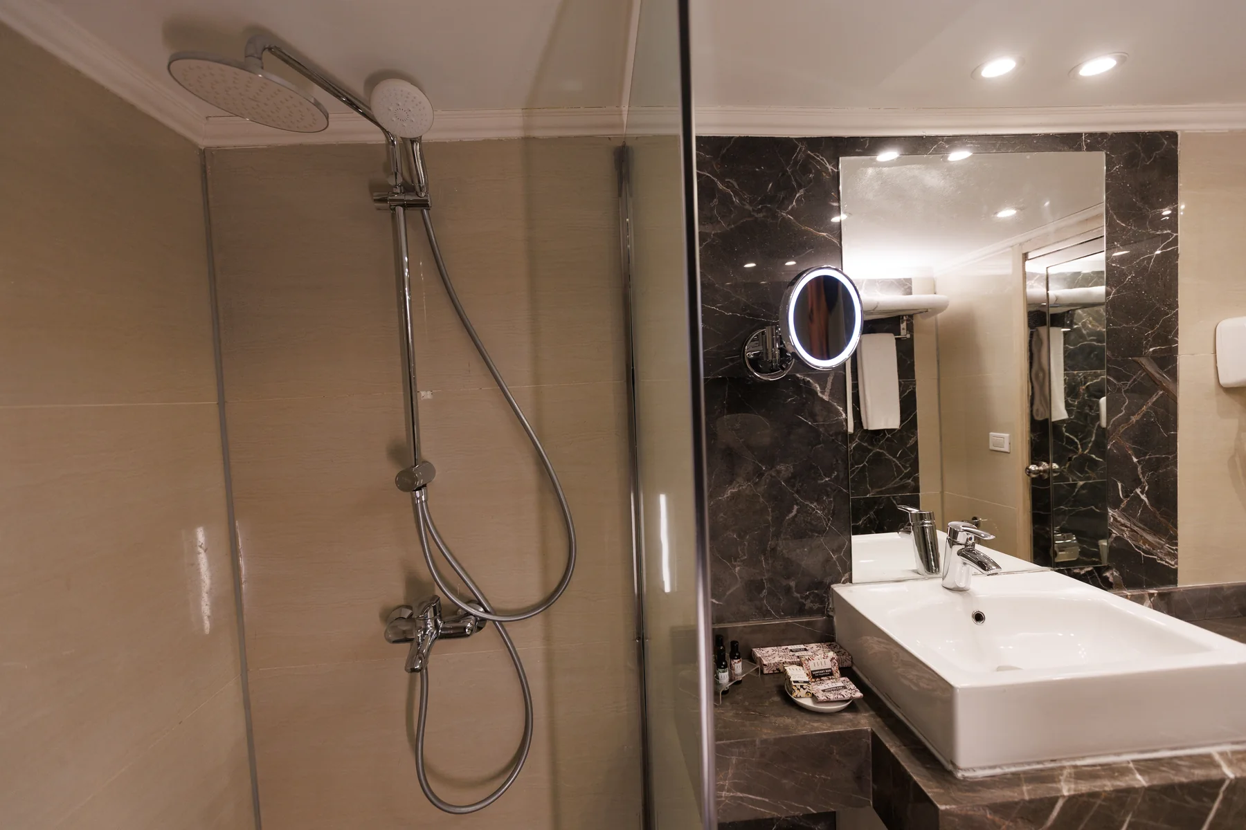 Shower in a bathroom aboard M/S Alma Nile Cruise