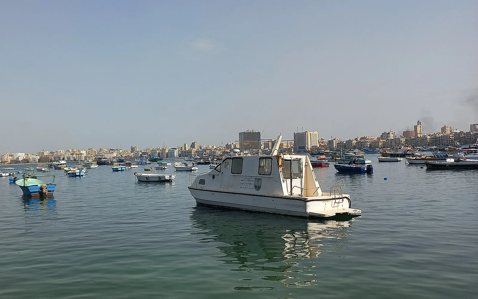 Boats and skyline at Alexandria Eastern Harbour near Qaitbay