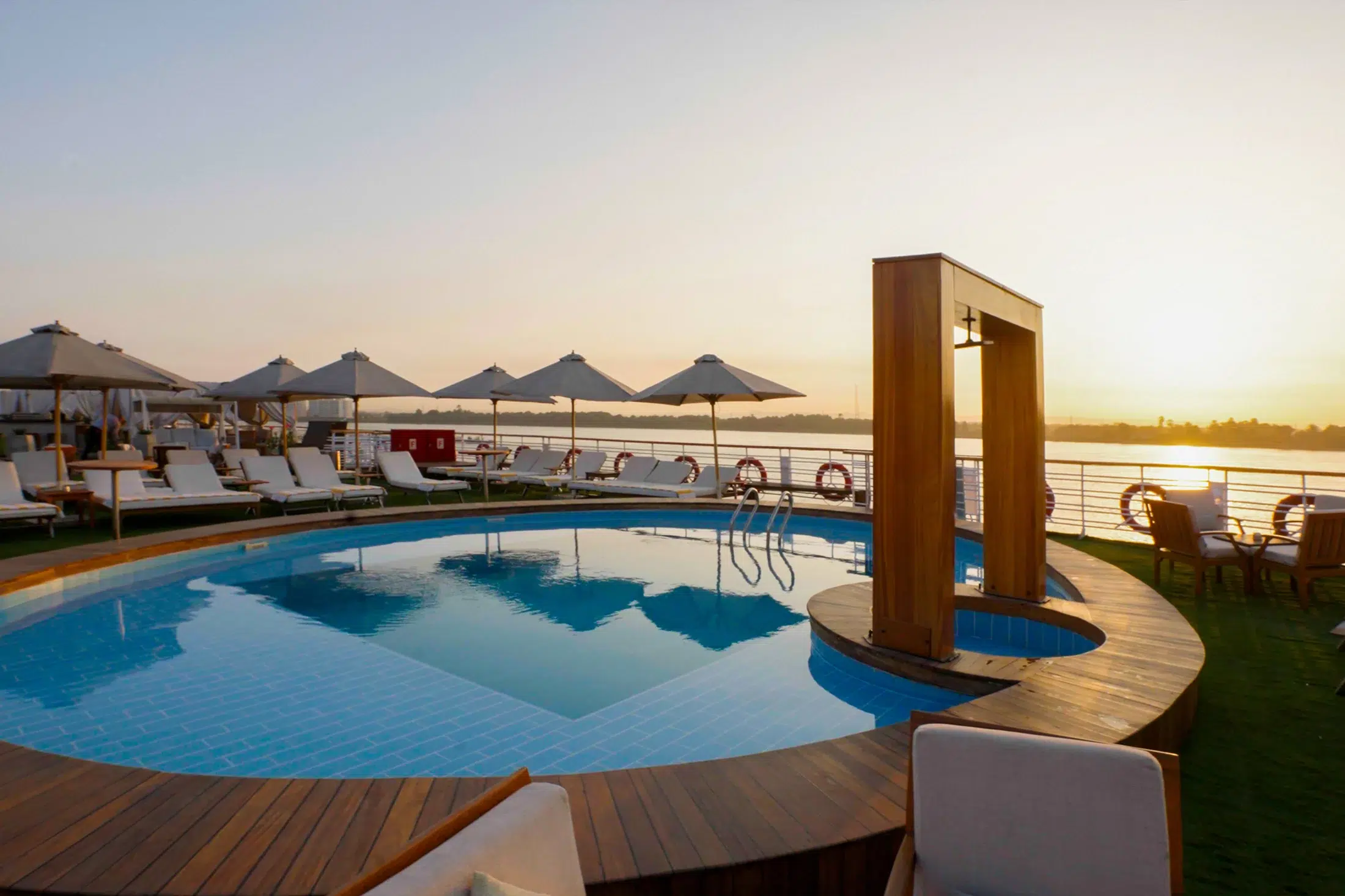 Sundeck pool aboard Farah Nile Cruise at sunset