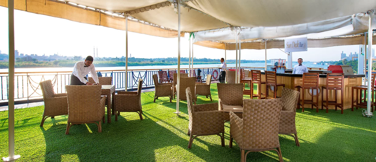 Sundeck bar and Nile seating aboard Amwaj Living Stone Nile Cruise