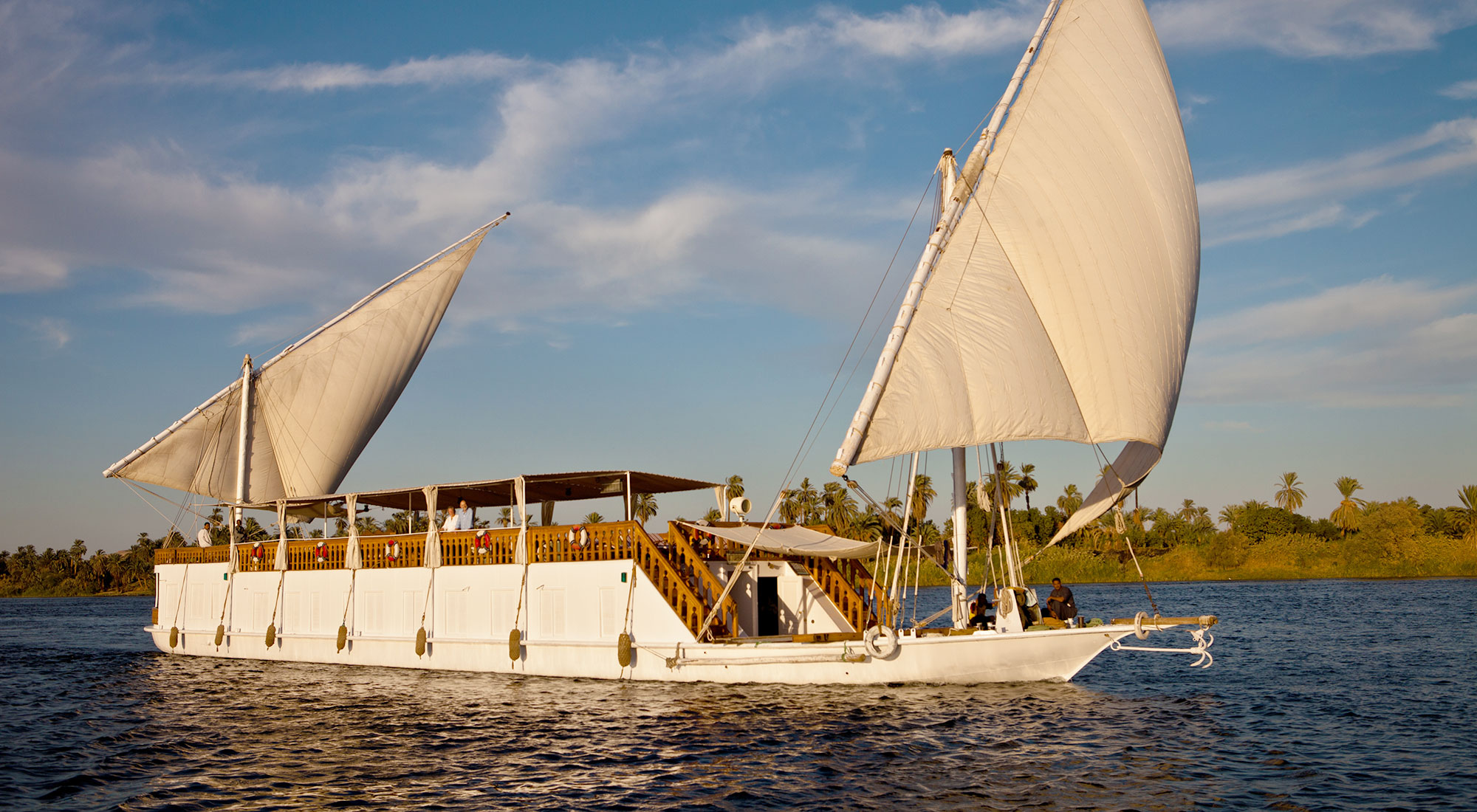 Representative dahabiya sailing on the Nile between Aswan and Luxor