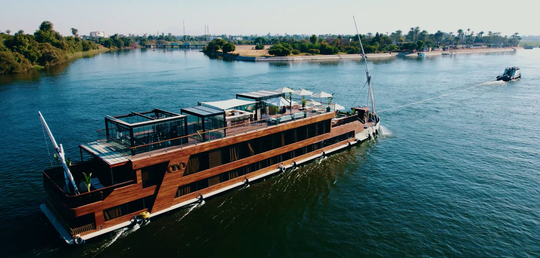 ORO I dahabiya sailing on the Nile with open deck seating
